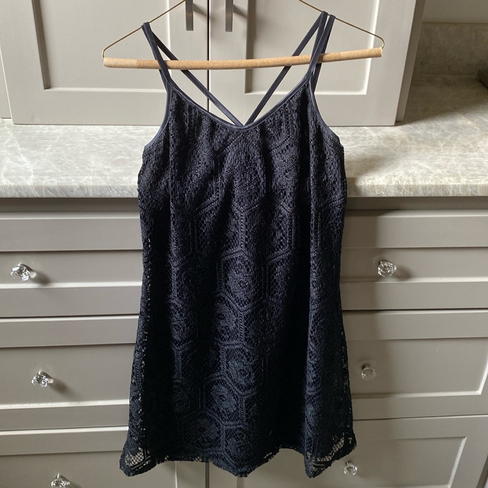 Women’s Black crotchet LBD in size medium.